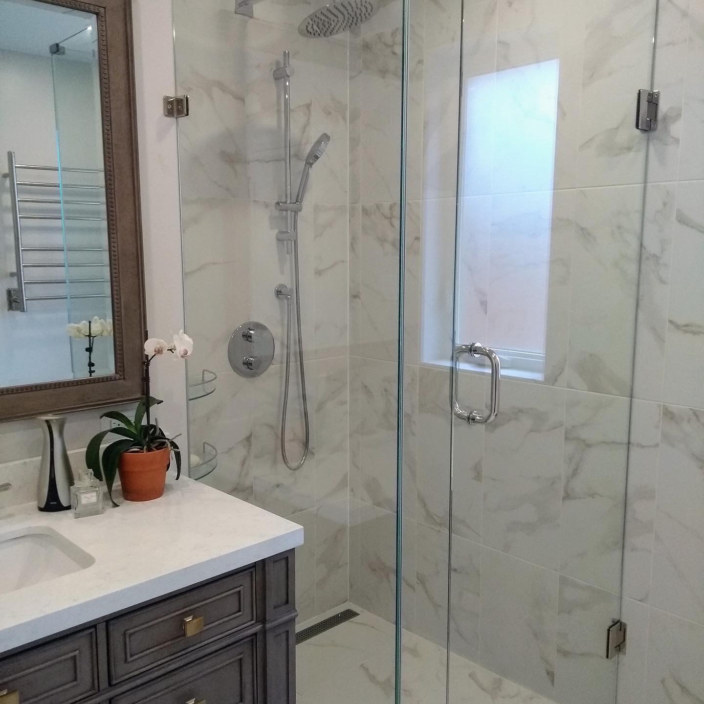 Curbless marble shower with towel warmer, 2020