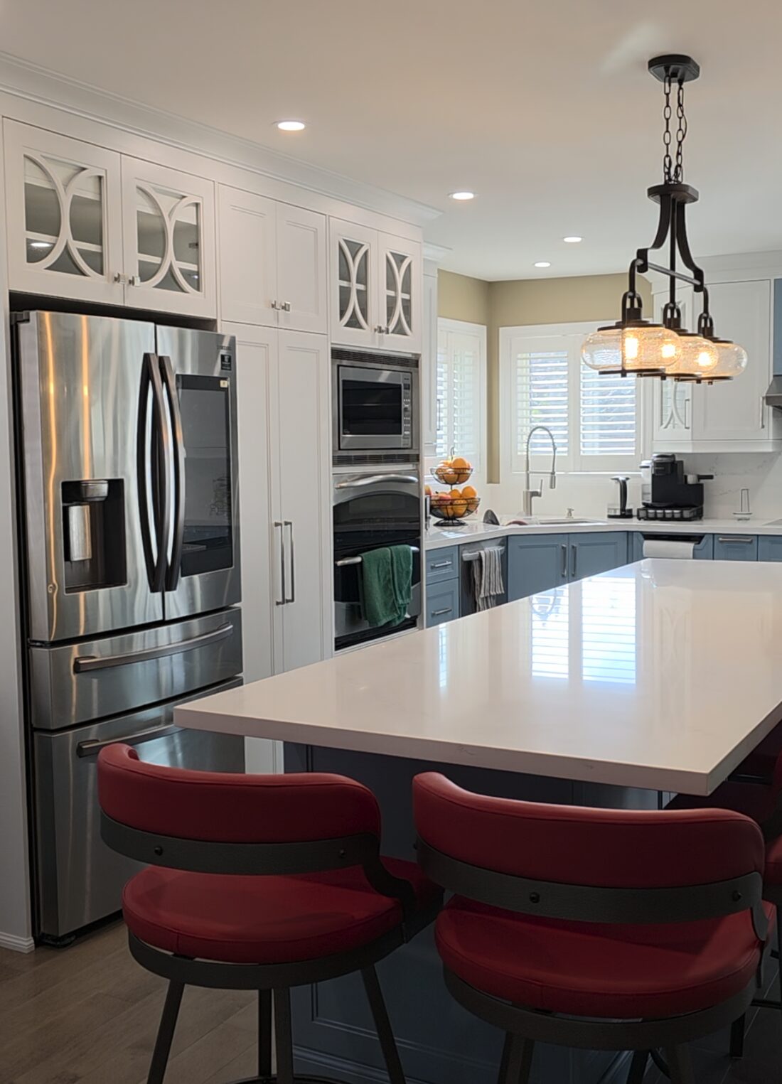 Open-concept kitchen with large island and seating — Reno-eX East Credit project, Mississauga 2025
