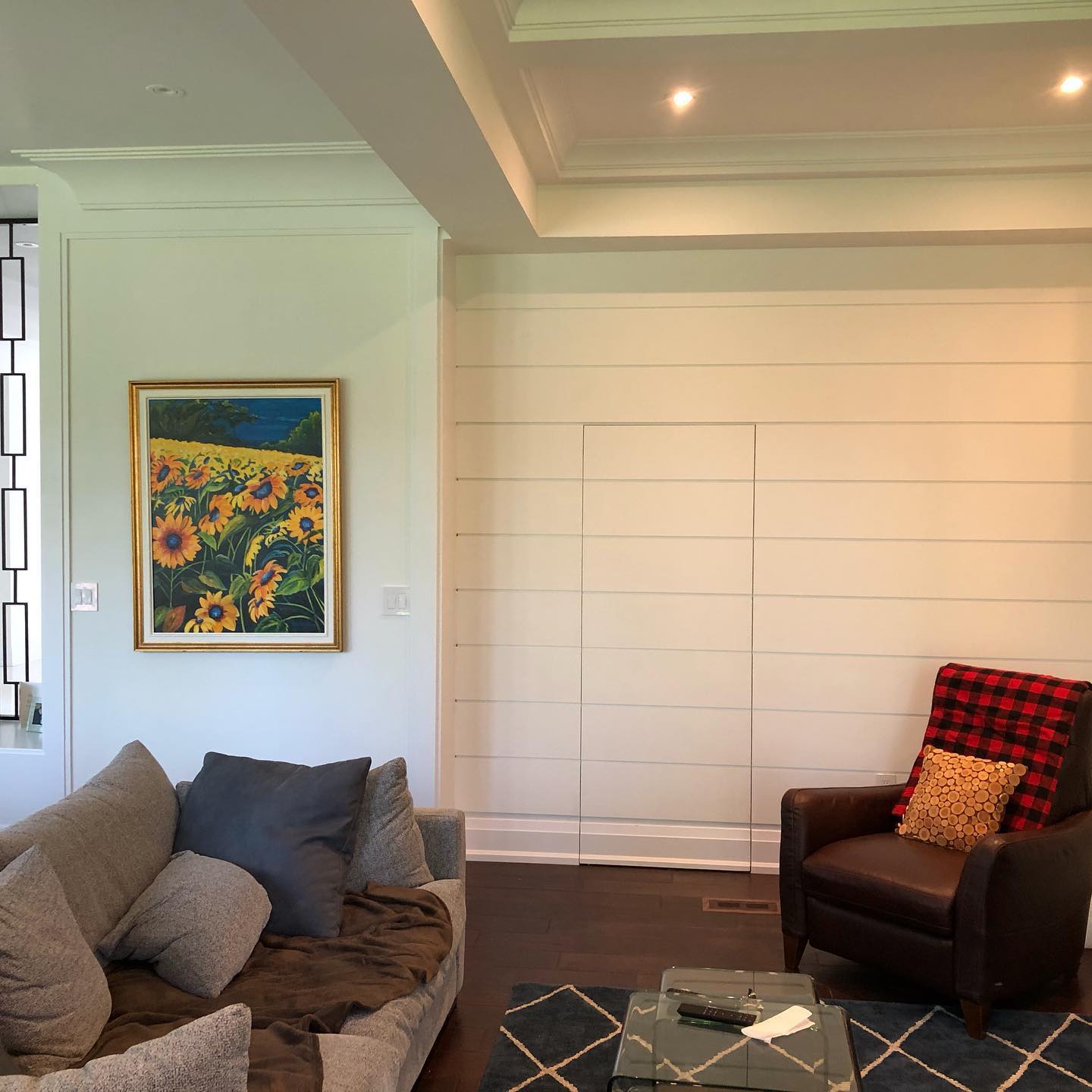 Renovated living room with shiplap feature wall — Reno-eX whole-home renovation